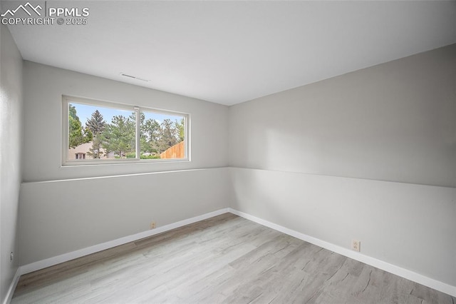 4408 Winding Cir, Colorado Springs, CO 80917 - spare room with wood finished floors and baseboards