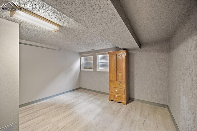 4408 Winding Cir, Colorado Springs, CO 80917 - below grade area with light wood-type flooring and baseboards
