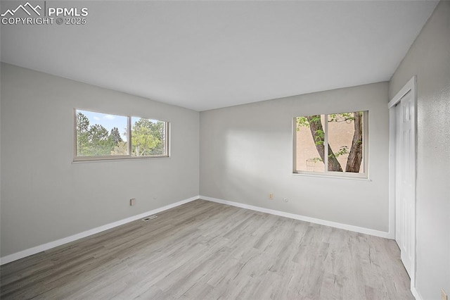 4408 Winding Cir, Colorado Springs, CO 80917 - spare room with plenty of natural light and wood finished floors