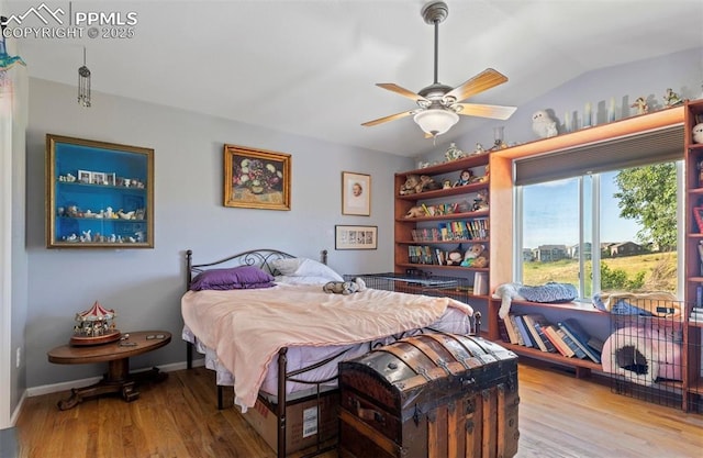 830 Winebrook Way, Fountain, CO 80817 - bedroom featuring wood finished floors, lofted ceiling, and ceiling fan