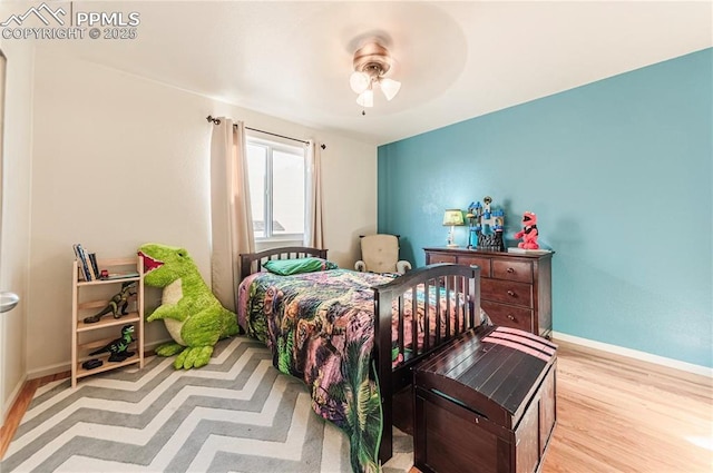 830 Winebrook Way, Fountain, CO 80817 - bedroom featuring baseboards, wood finished floors, and ceiling fan