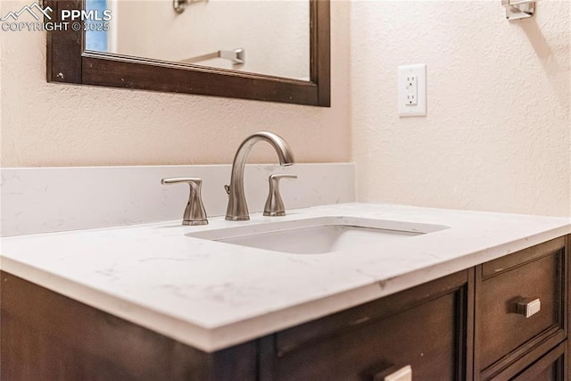 830 Winebrook Way, Fountain, CO 80817 - bathroom view of vanity and a textured wall