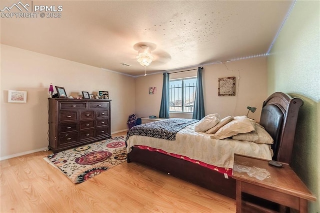 830 Winebrook Way, Fountain, CO 80817 - bedroom featuring wood finished floors and baseboards