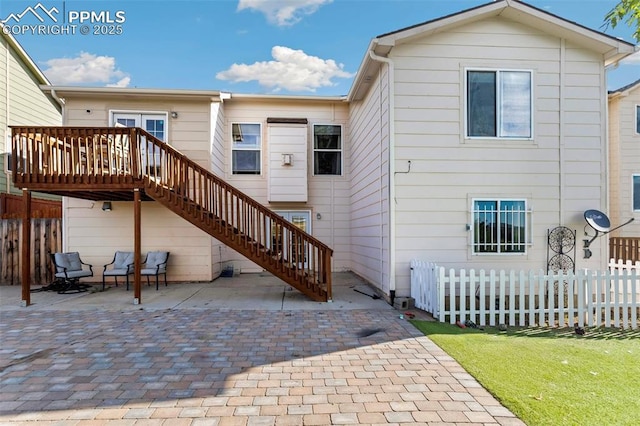 830 Winebrook Way, Fountain, CO 80817 - rear view of house with a patio area, stairway, and a deck