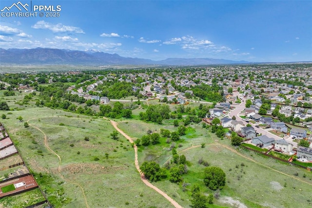 830 Winebrook Way, Fountain, CO 80817 - aerial overview of property's location featuring a mountainous background and nearby suburban area
