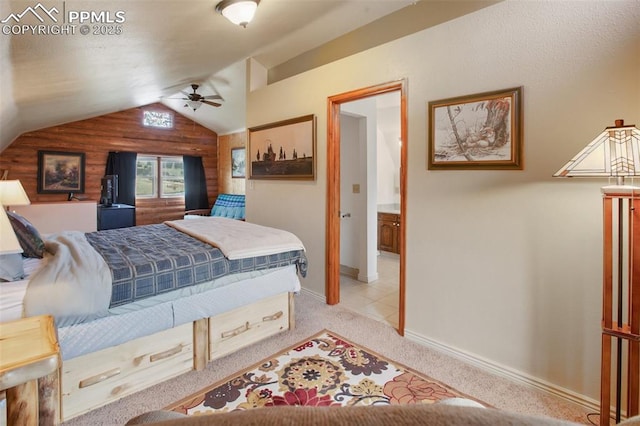 226 W El Paso Ave, Cripple Creek, CO 80813 - bedroom with lofted ceiling, light carpet, and wood walls