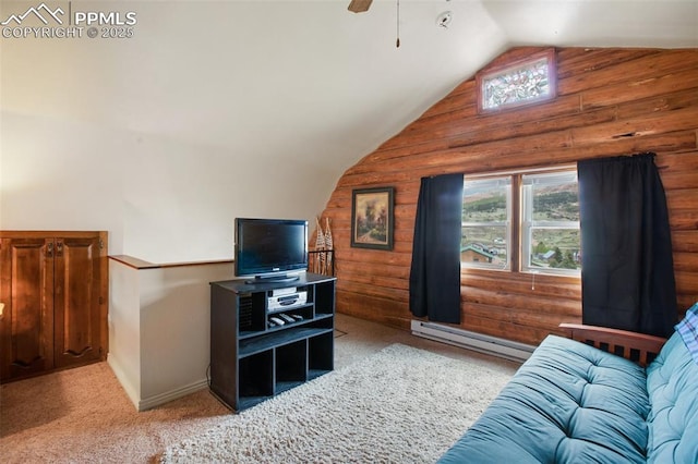 226 W El Paso Ave, Cripple Creek, CO 80813 - living room with lofted ceiling, a baseboard radiator, carpet, wooden walls, and a ceiling fan