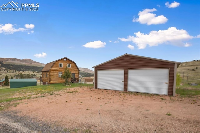 226 W El Paso Ave, Cripple Creek, CO 80813 - detached garage with a mountain view
