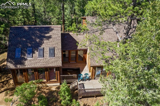 886 Cottonwood Lake Dr, Divide, CO 80814 - view of front of home featuring roof with shingles and a deck