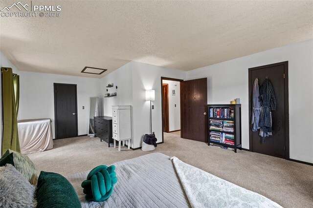 4303 W Eastcrest Cir, Colorado Springs, CO 80916 - bedroom with carpet, a textured ceiling, and baseboards