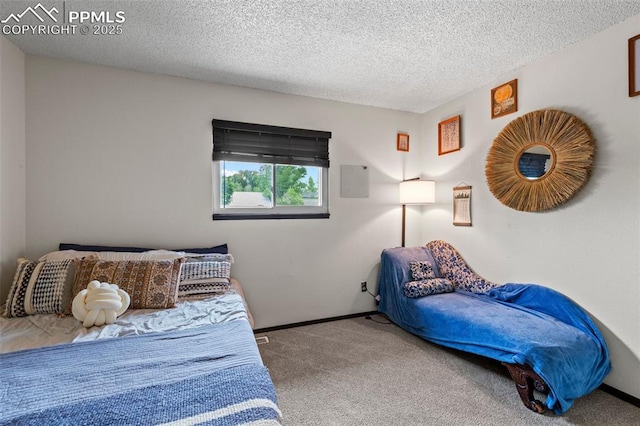 4303 W Eastcrest Cir, Colorado Springs, CO 80916 - carpeted bedroom featuring baseboards and a textured ceiling
