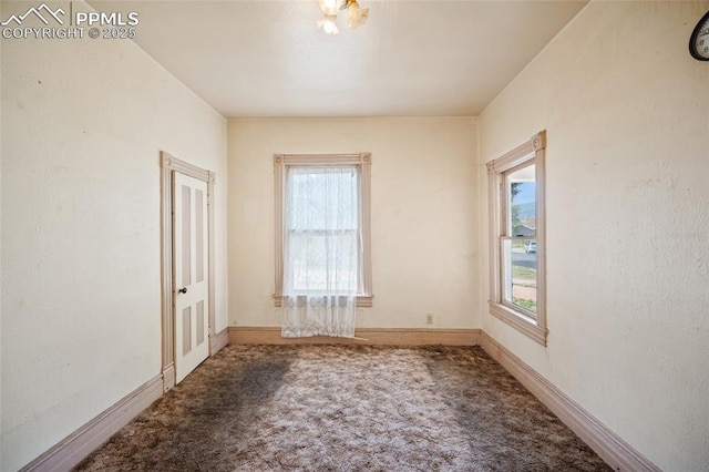 117 S Limit St, Colorado Springs, CO 80905 - carpeted empty room featuring baseboards