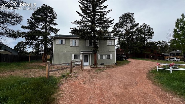 418 N Baldwin St, Woodland Park, CO 80863 - traditional-style house with dirt driveway