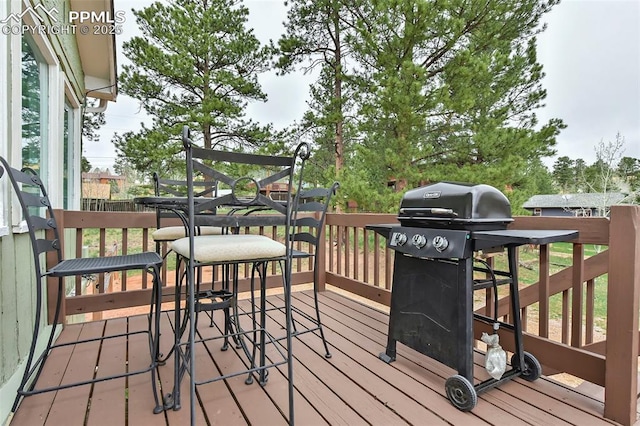 418 N Baldwin St, Woodland Park, CO 80863 - wooden deck with a grill
