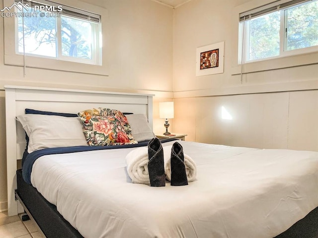 418 N Baldwin St, Woodland Park, CO 80863 - tiled bedroom featuring a decorative wall