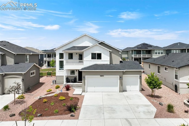 6471 Rolling Creek Dr, Colorado Springs, CO 80924 - view of front of house with a balcony, a residential view, driveway, board and batten siding, and a garage
