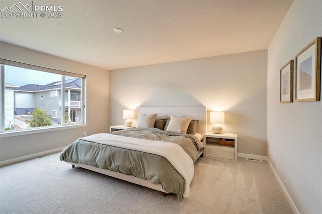6471 Rolling Creek Dr, Colorado Springs, CO 80924 - carpeted bedroom featuring baseboards and a textured ceiling