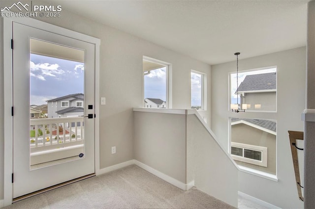 6471 Rolling Creek Dr, Colorado Springs, CO 80924 - entryway featuring carpet and baseboards