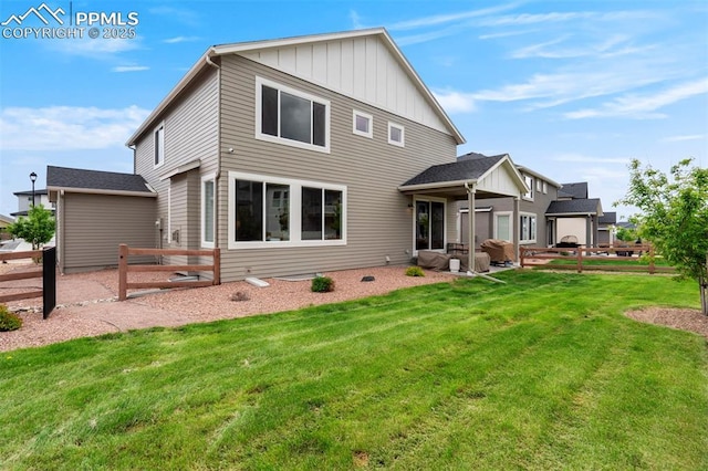 6471 Rolling Creek Dr, Colorado Springs, CO 80924 - rear view of house featuring board and batten siding