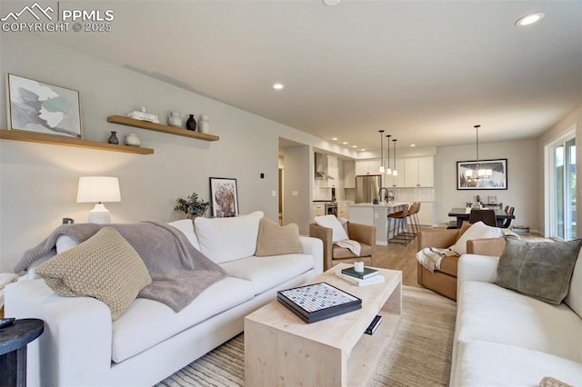 6471 Rolling Creek Dr, Colorado Springs, CO 80924 - living area with recessed lighting, light wood-type flooring, and a chandelier