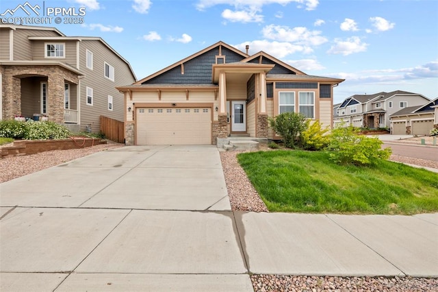 6374 Tramore Way, Colorado Springs, CO 80923 - craftsman inspired home with an attached garage, driveway, stone siding, a front yard, and a residential view