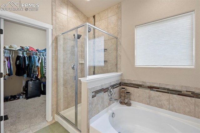 6374 Tramore Way, Colorado Springs, CO 80923 - full bathroom with a garden tub, a stall shower, and a spacious closet