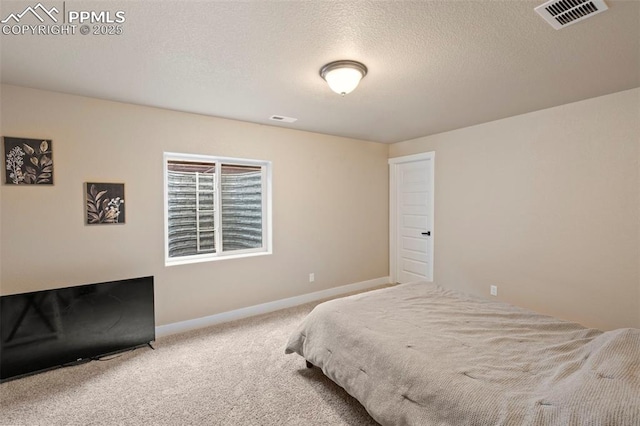 6374 Tramore Way, Colorado Springs, CO 80923 - bedroom featuring carpet floors and a textured ceiling