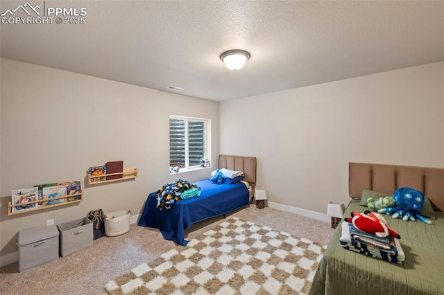 6374 Tramore Way, Colorado Springs, CO 80923 - bedroom with carpet flooring and a textured ceiling