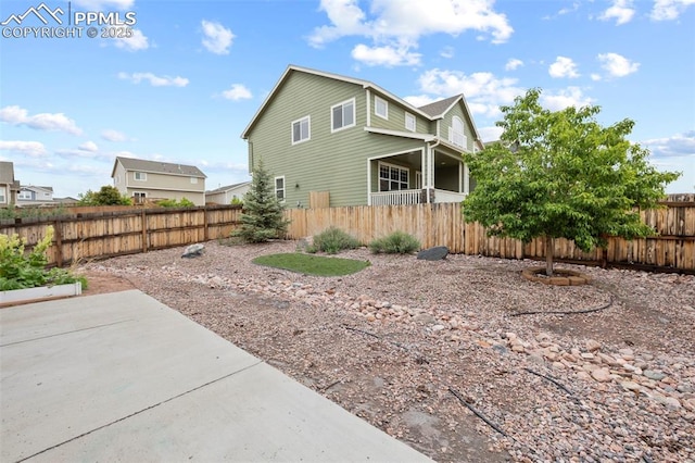 6374 Tramore Way, Colorado Springs, CO 80923 - view of side of home featuring a fenced backyard and a patio