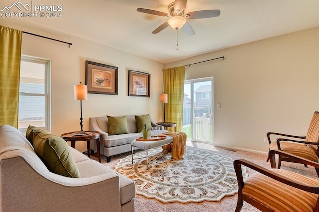 6676 Liberator Trl, Colorado Springs, CO 80925 - carpeted living area featuring ceiling fan and baseboards