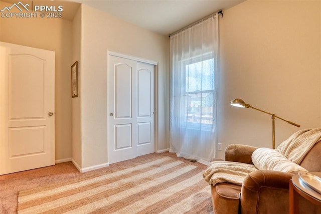 6676 Liberator Trl, Colorado Springs, CO 80925 - sitting room with light colored carpet and baseboards