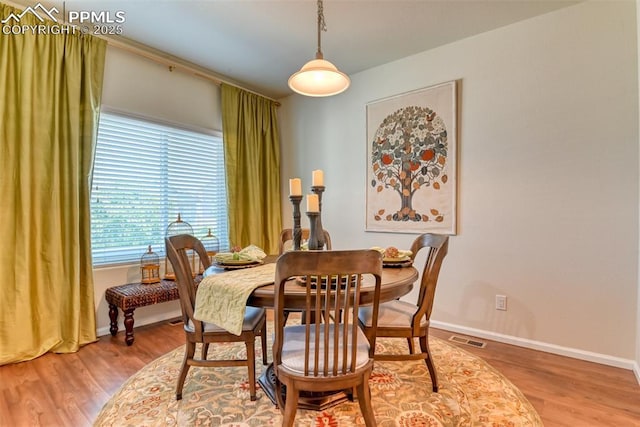 6676 Liberator Trl, Colorado Springs, CO 80925 - dining space with wood finished floors and baseboards