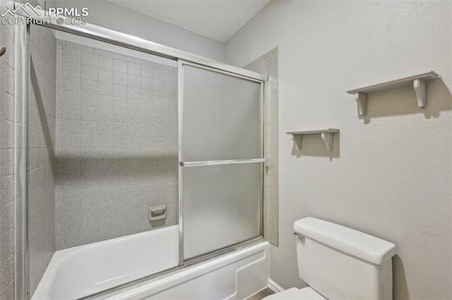 2013 Erin Loop, Colorado Springs, CO 80918 - bathroom featuring toilet and combined bath / shower with glass door