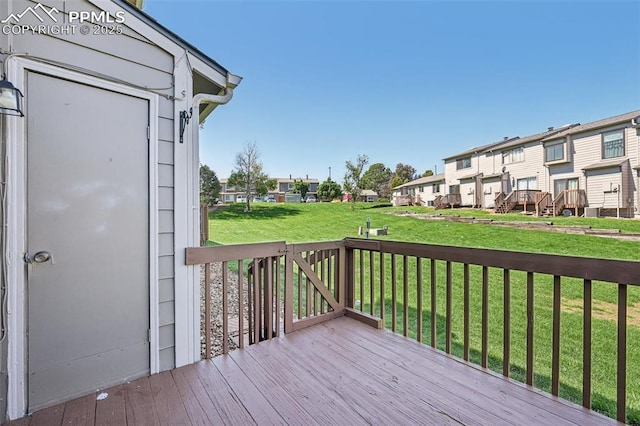 2013 Erin Loop, Colorado Springs, CO 80918 - deck with a residential view and a lawn
