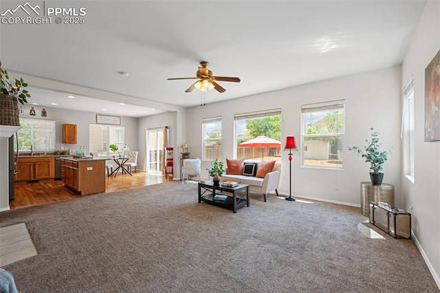 8370 Lupan Dr, Colorado Springs, CO 80951 - carpeted living area with a ceiling fan and recessed lighting