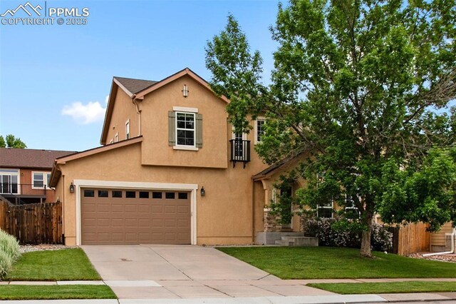 6874 Quiet Pond Pl, Colorado Springs, CO 80923 - mediterranean / spanish-style home featuring stucco siding and concrete driveway