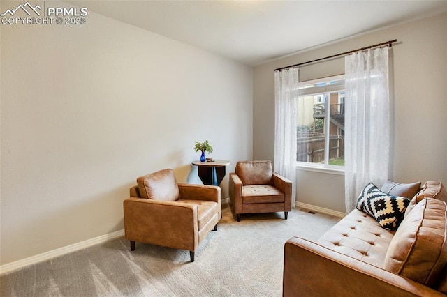 6874 Quiet Pond Pl, Colorado Springs, CO 80923 - living area with baseboards and light carpet