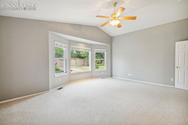 14115 Nichlas Ct, Colorado Springs, CO 80921 - carpeted spare room with lofted ceiling, a ceiling fan, and baseboards