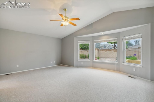 14115 Nichlas Ct, Colorado Springs, CO 80921 - carpeted empty room with lofted ceiling, baseboards, and ceiling fan