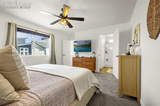 5784 Tramore Ct, Colorado Springs, CO 80938 - carpeted bedroom with a ceiling fan, baseboards, and ensuite bath