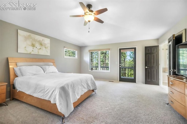 1240 Lone Scout Lookout, Monument, CO 80132 - carpeted bedroom featuring access to outside and ceiling fan