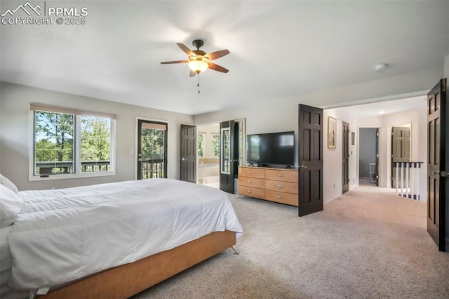 1240 Lone Scout Lookout, Monument, CO 80132 - bedroom featuring light colored carpet, access to outside, ensuite bath, and a ceiling fan