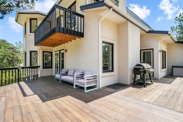 1240 Lone Scout Lookout, Monument, CO 80132 - deck featuring grilling area and outdoor lounge area