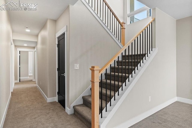 8545 Bailiff Dr, Peyton, CO 80831 - staircase featuring carpet and baseboards
