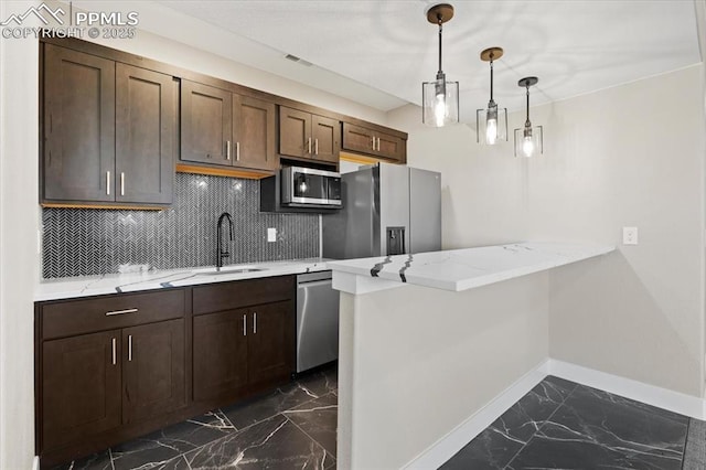 8545 Bailiff Dr, Peyton, CO 80831 - kitchen with dark marble finish flooring, stainless steel appliances, a sink, baseboards, and backsplash