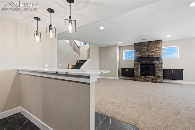 8545 Bailiff Dr, Peyton, CO 80831 - kitchen featuring baseboards, plenty of natural light, carpet, marble finish flooring, and recessed lighting