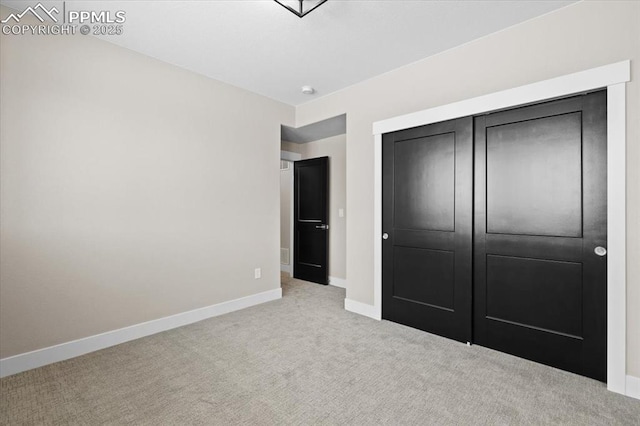 8545 Bailiff Dr, Peyton, CO 80831 - unfurnished bedroom featuring carpet flooring, baseboards, and a closet