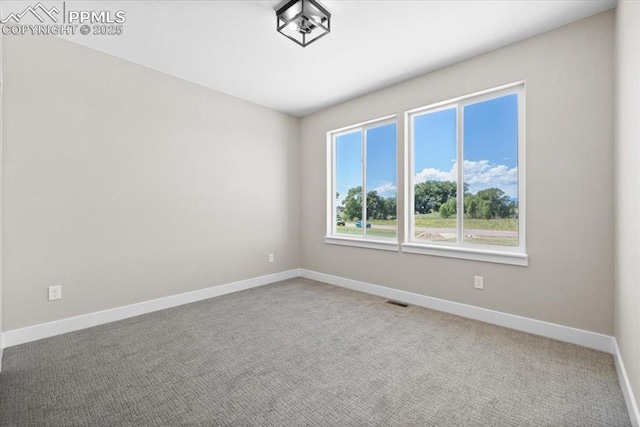 8545 Bailiff Dr, Peyton, CO 80831 - spare room with baseboards and carpet
