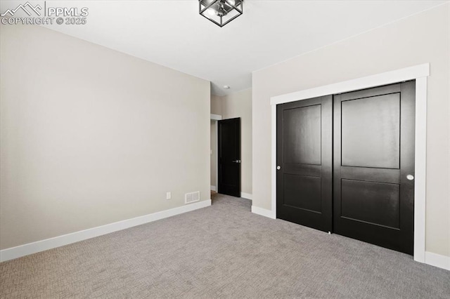 8545 Bailiff Dr, Peyton, CO 80831 - unfurnished bedroom featuring carpet floors, baseboards, and a closet