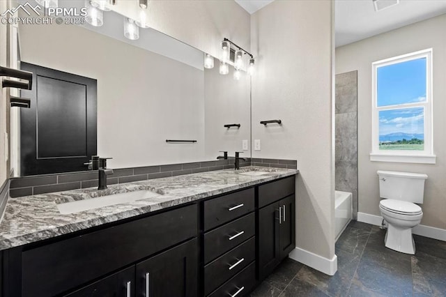 8545 Bailiff Dr, Peyton, CO 80831 - bathroom featuring double vanity, baseboards, toilet, shower / bath combination, and marble finish flooring
